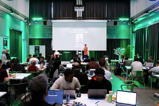 Attendees collaborating at the Diwan Hackathon in Helsinki